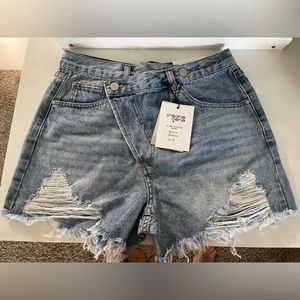 Insane genes high waist asymmetric button Jean shorts